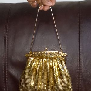 Vintage purse, new in box, neber used, golg and silver tone,mediun size$50bouth
